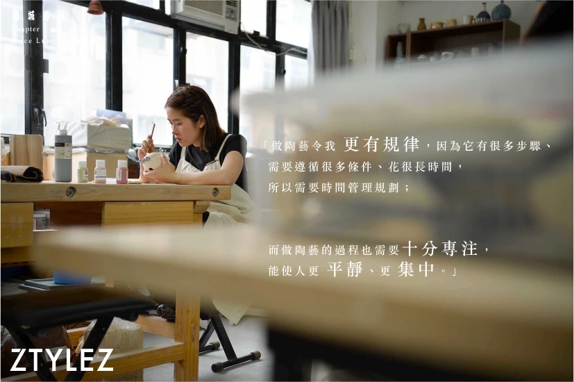 Ceramic works displayed on wooden shelves